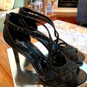 Black Glossy Heels with Intricate Cut-Out Design